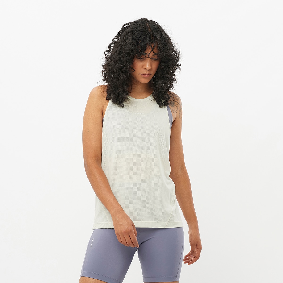 Salomon - Camiseta sin mangas de mujer SHKout CORE Salomon.